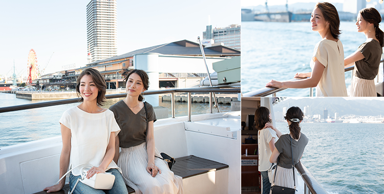 写真：神戸港クルージングを楽しむ女性2人